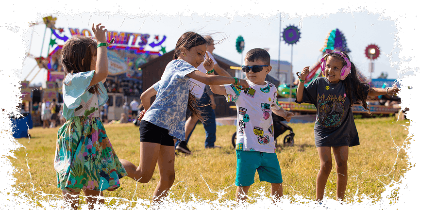 Kids playing together at a festival